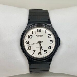 Casio MQ-24 1330 black tone plastic watch 33mm round white dial quartz running